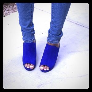 Blue, open-toe, faux suede mules.